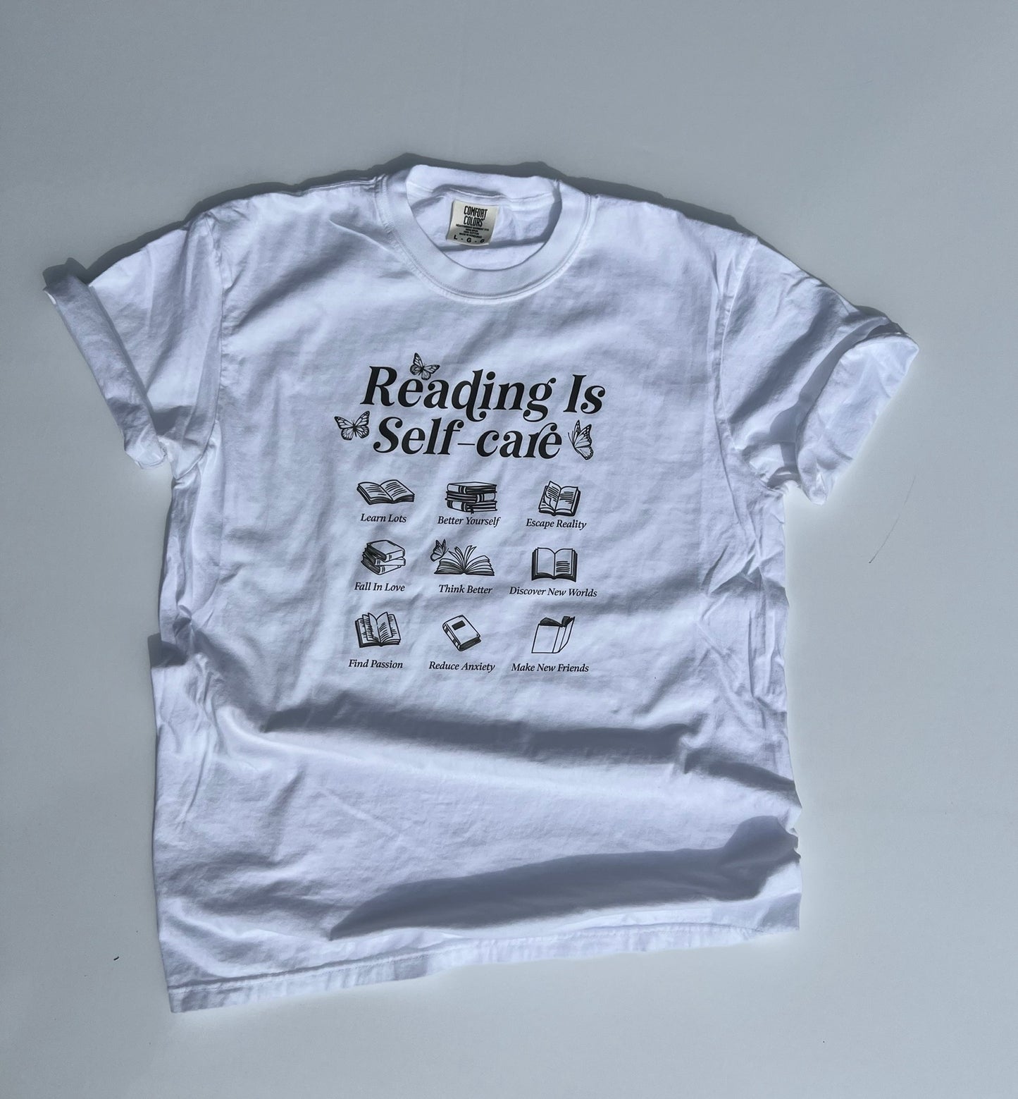 reading is self-care tee
